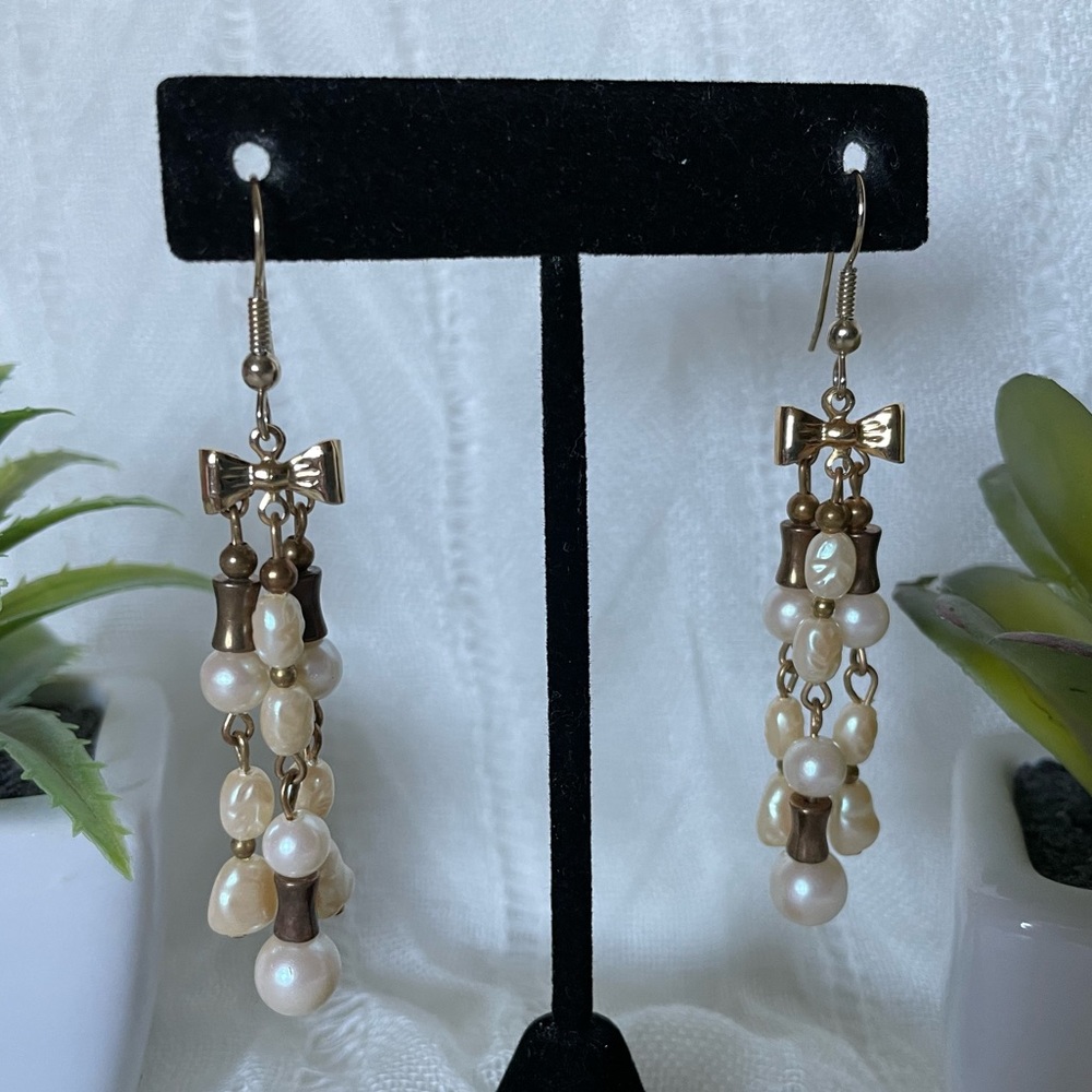 Gold tone bow with faux Pearl, pink flower clip on, white faux Pearl back post